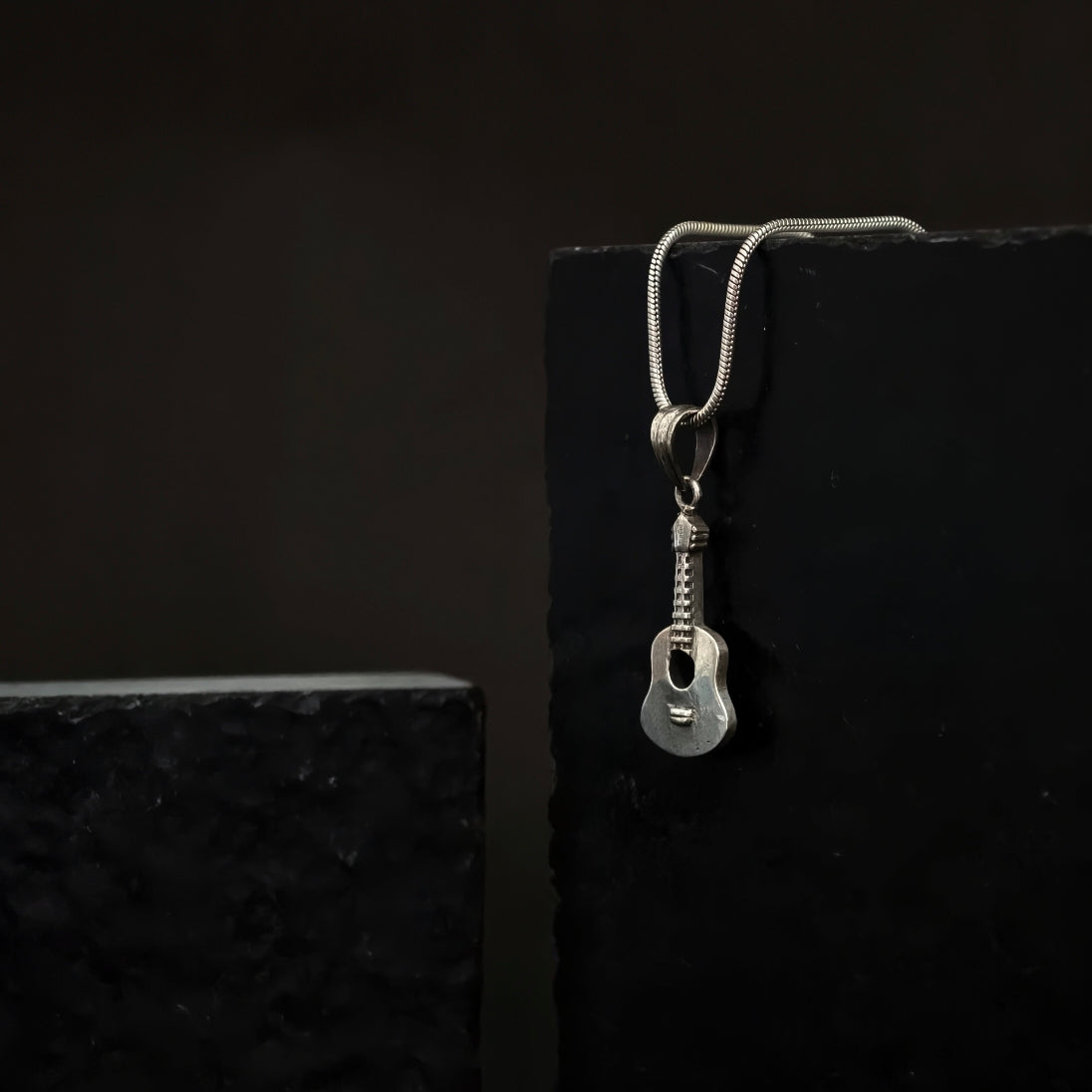 Strum Pendant