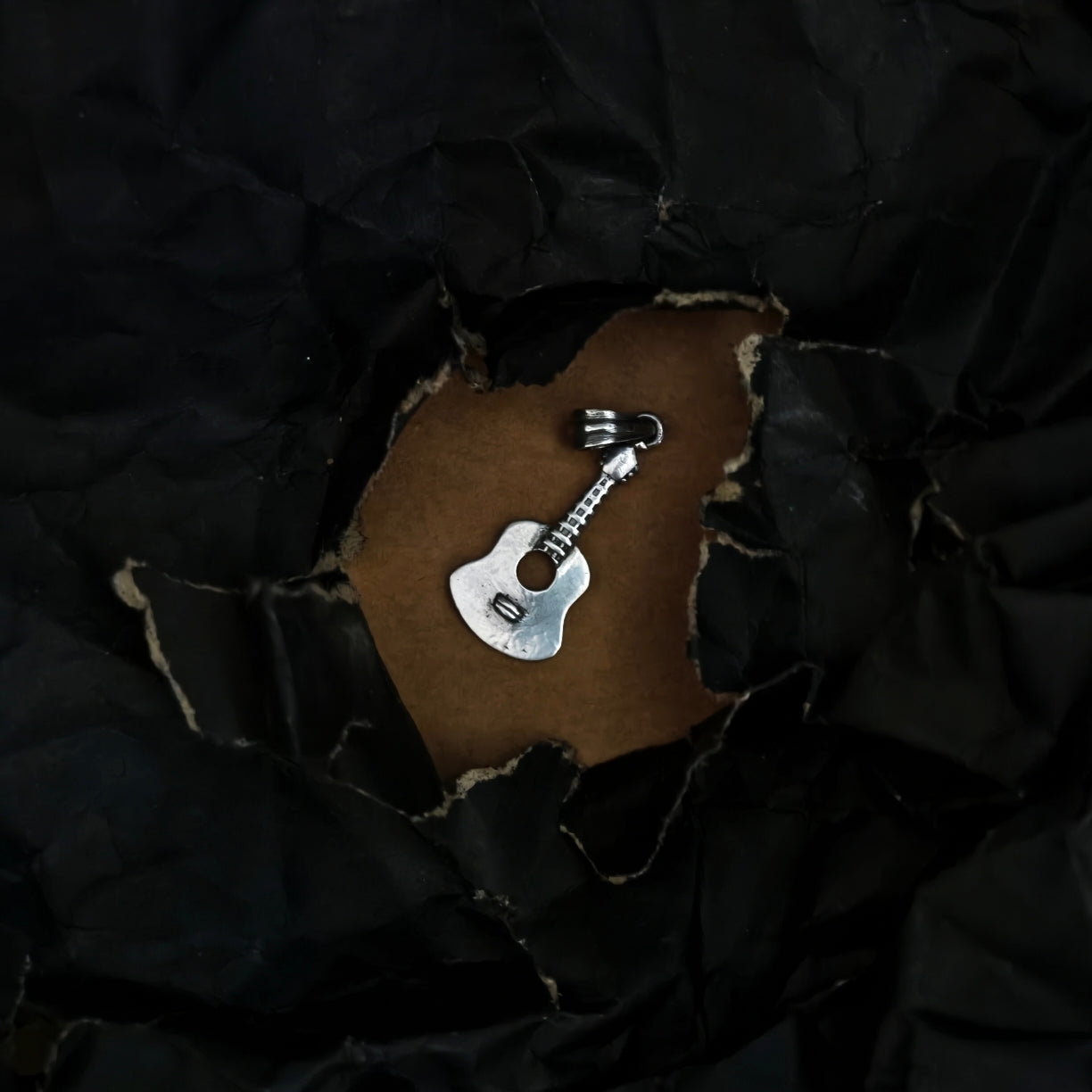 Strum Pendant